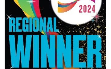 Great British Care Awards Regional Winner 2024 on a black starry background with a pop of pink, blue, green and yellow colour in a wave behind